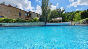 Maison charmante au cœur de Puy-l'Évêque avec piscine partagée